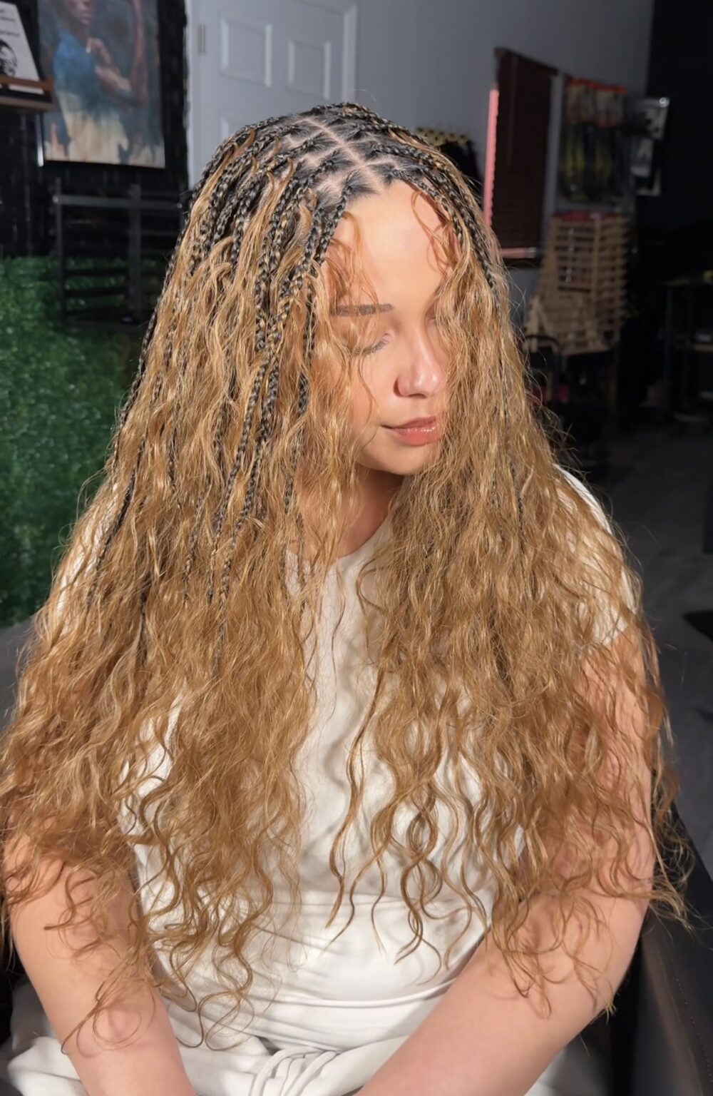 A woman with long hair and dreadlocks.